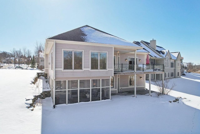 view of snow covered property