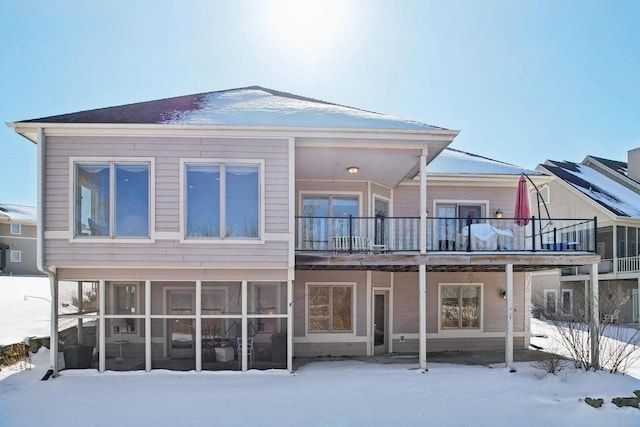 view of snow covered house