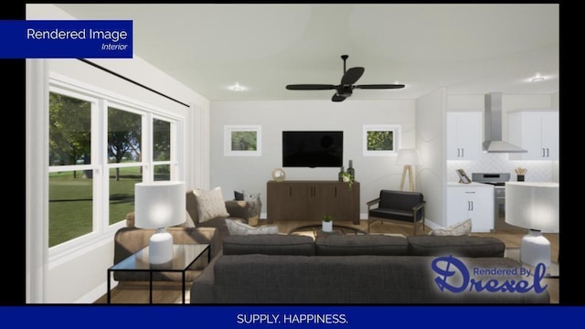 living room with plenty of natural light, a ceiling fan, and baseboards