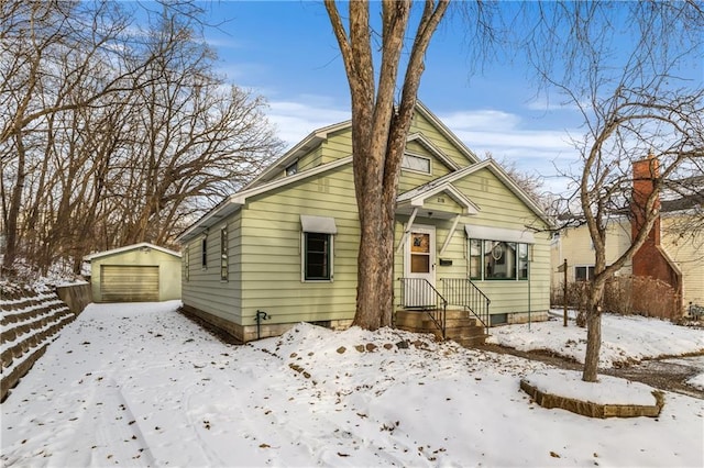 view of front of home featuring an outbuilding and a garage