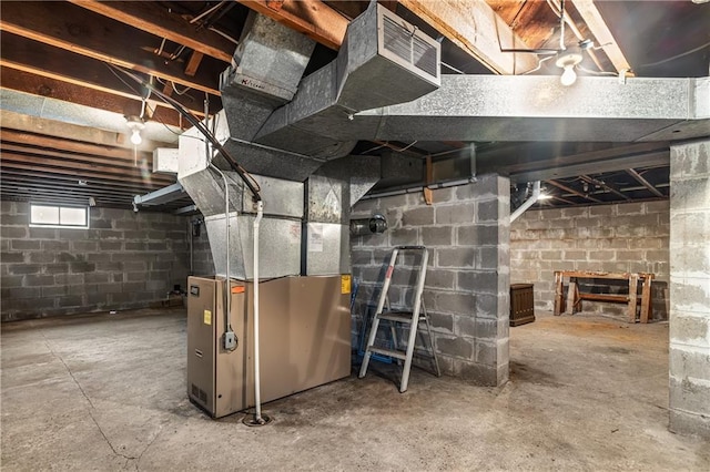 basement featuring heating unit