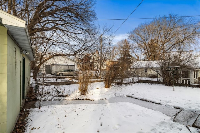 view of yard covered in snow