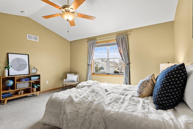 bedroom featuring a ceiling fan, baseboards, visible vents, carpet floors, and lofted ceiling