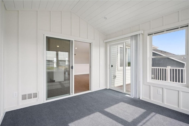 unfurnished sunroom with lofted ceiling