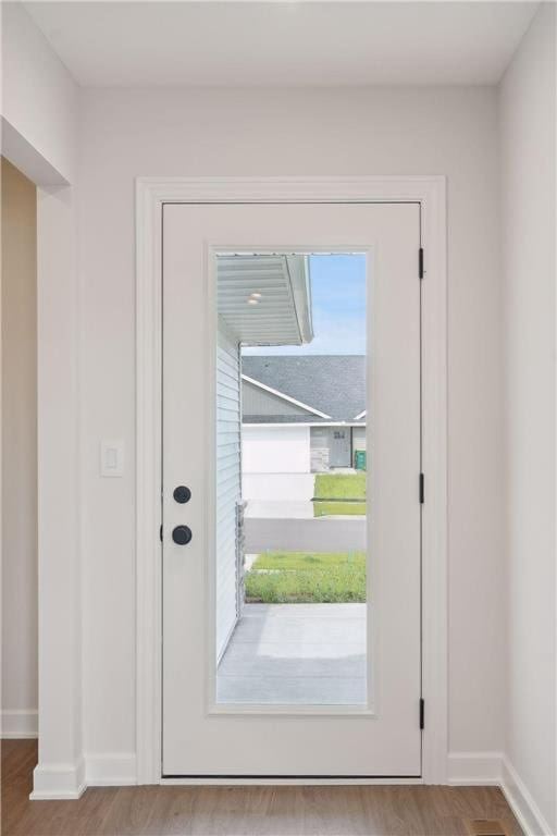 entryway with light hardwood / wood-style flooring