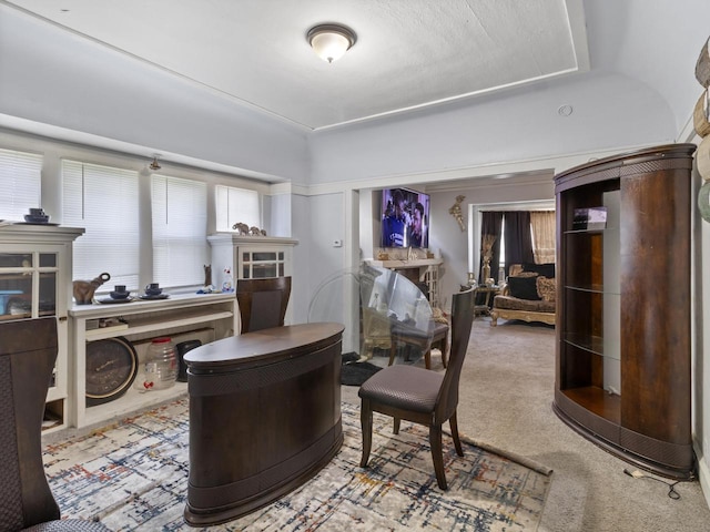 office area with plenty of natural light and carpet