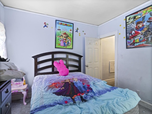 bedroom featuring crown molding and carpet flooring