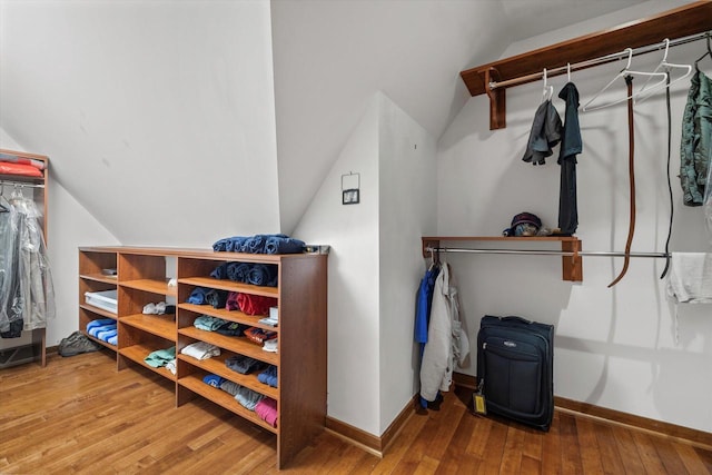 spacious closet featuring hardwood / wood-style flooring