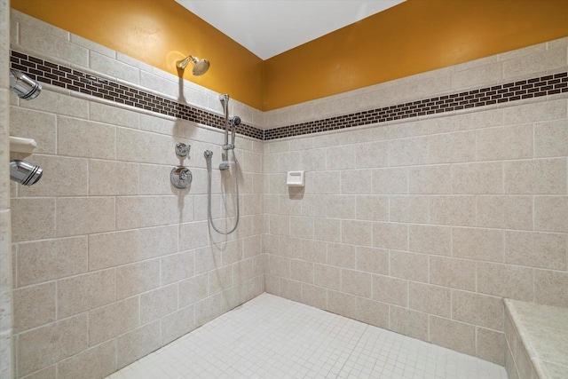 bathroom featuring tiled shower