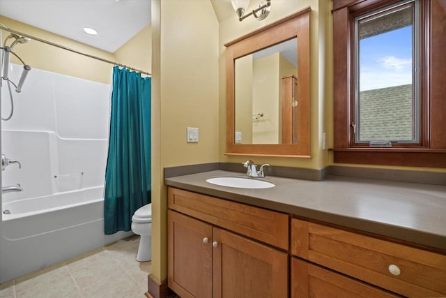 full bathroom featuring vanity, shower / tub combo, and toilet