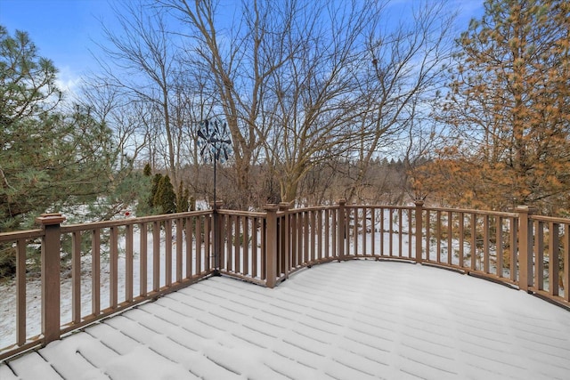 view of snow covered deck