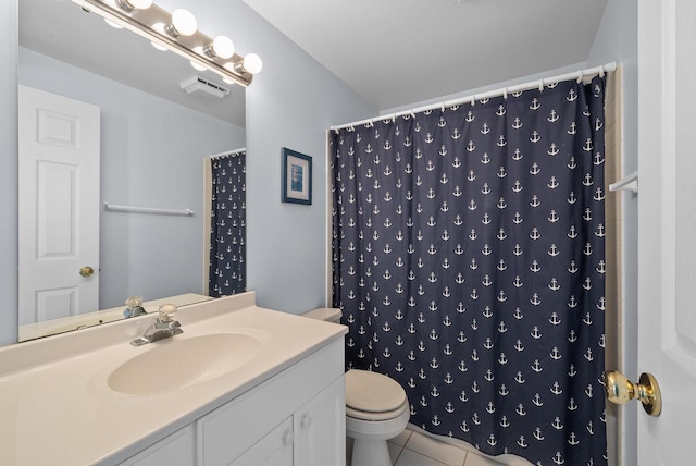 bathroom with a shower with curtain, tile patterned floors, toilet, and vanity