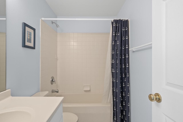 full bathroom featuring vanity, toilet, and shower / bath combo with shower curtain