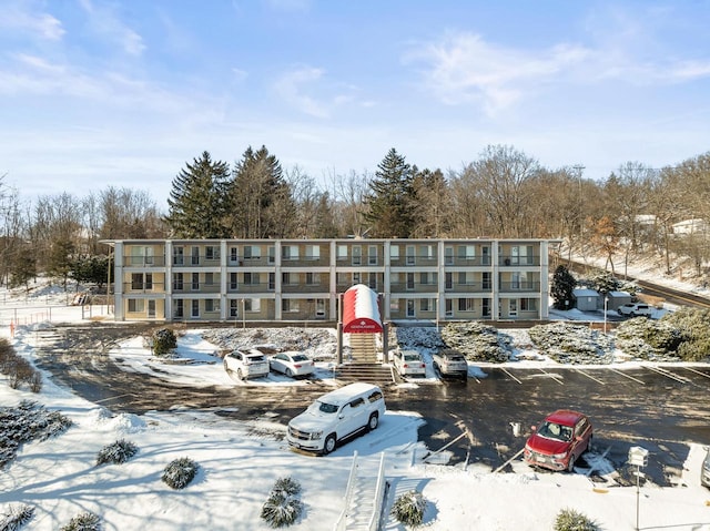 view of snow covered property