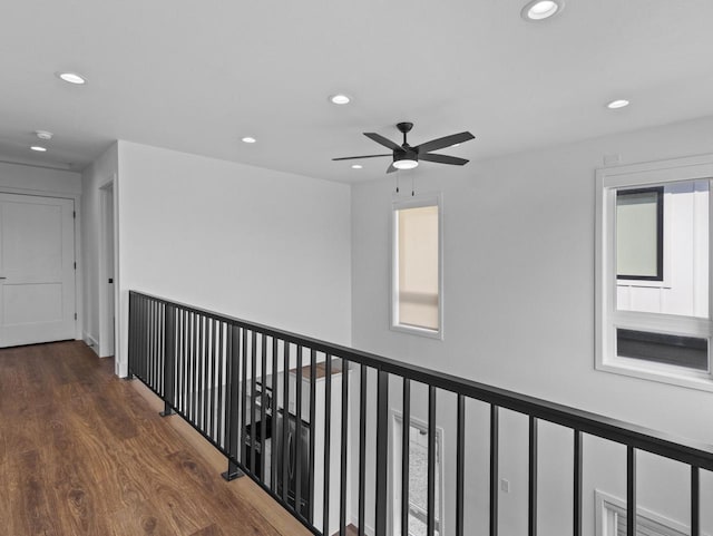 hallway with dark hardwood / wood-style floors