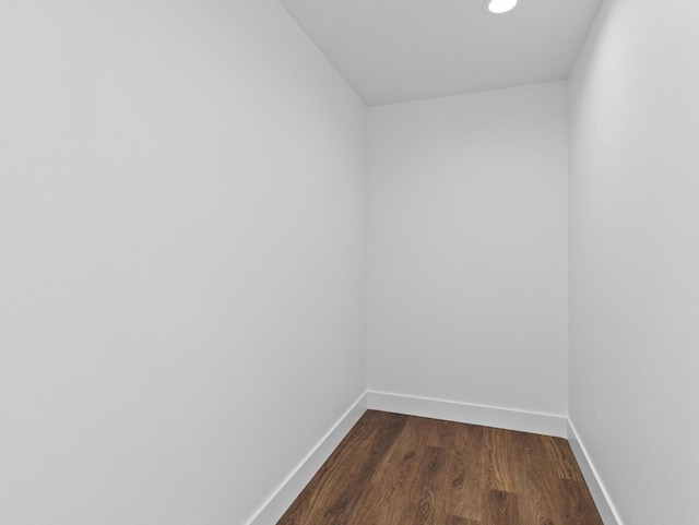 spare room featuring dark hardwood / wood-style flooring