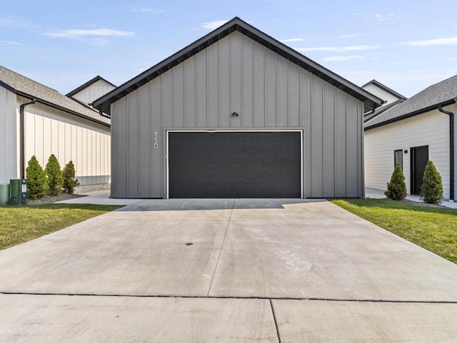 garage with a yard