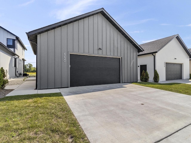 garage with a yard