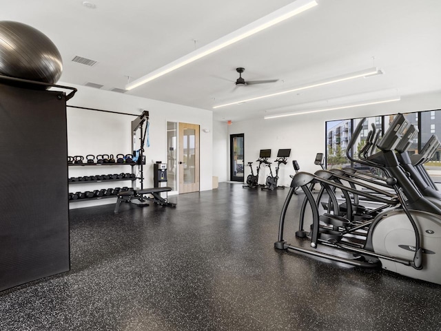 exercise room featuring french doors and ceiling fan