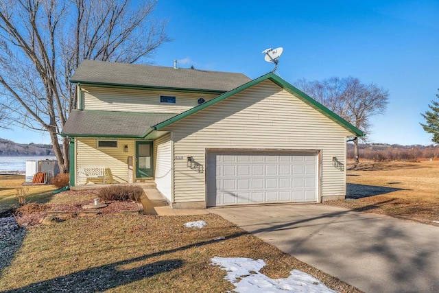 front of property with a garage