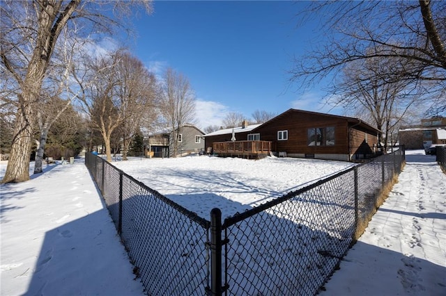 view of yard layered in snow