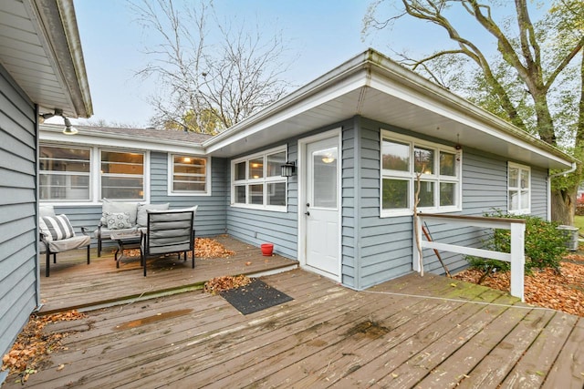 deck with an outdoor hangout area