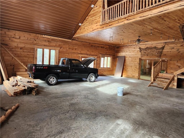 garage with wood walls and wood ceiling