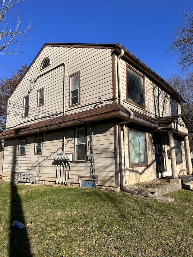 exterior space featuring a front lawn