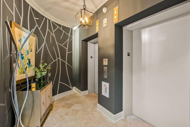 interior space featuring crown molding, elevator, and a notable chandelier