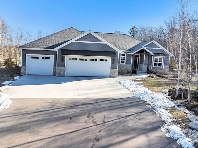 craftsman inspired home featuring a garage