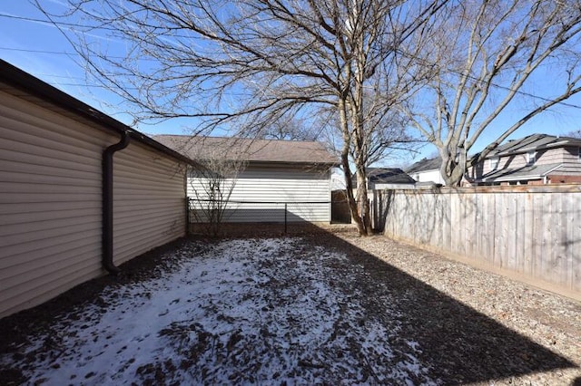 view of yard covered in snow