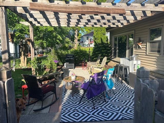 view of patio featuring a pergola