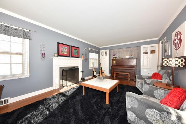 living room featuring crown molding and hardwood / wood-style floors