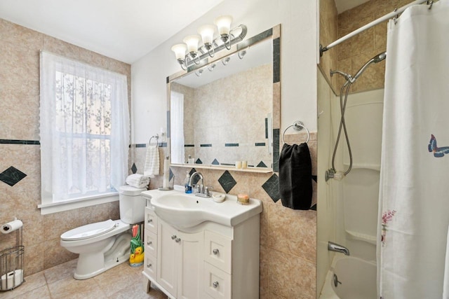 full bathroom featuring shower / tub combo with curtain, tile walls, vanity, toilet, and tile patterned floors