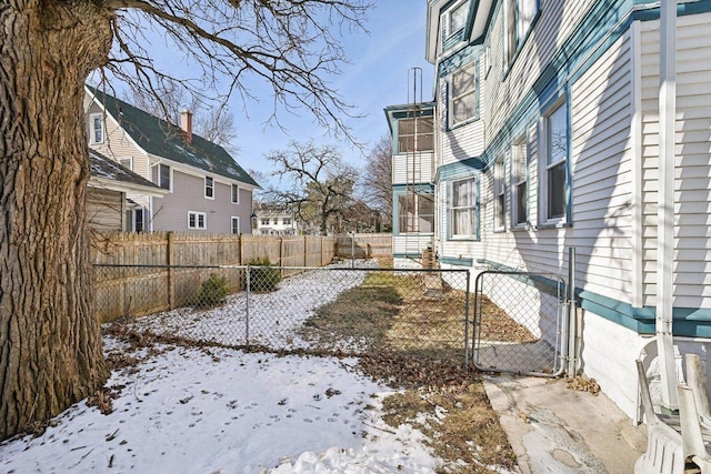 view of yard covered in snow