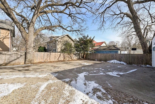 view of yard layered in snow