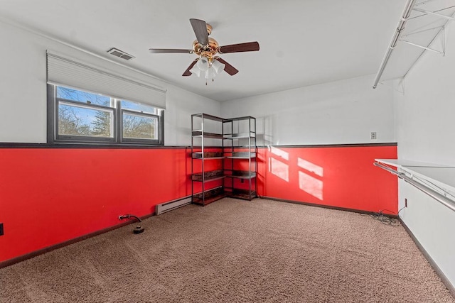 interior space with carpet flooring and ceiling fan