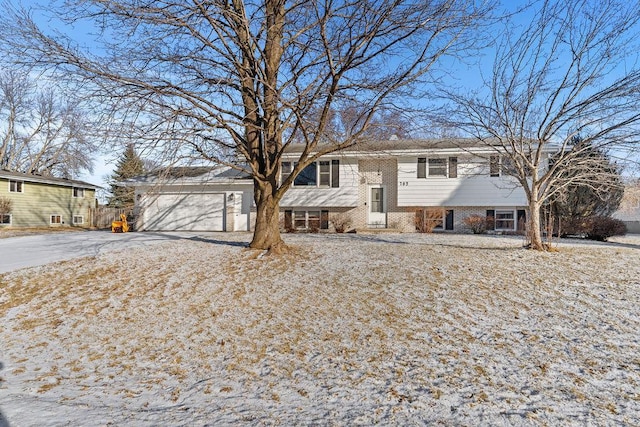 split foyer home featuring a garage