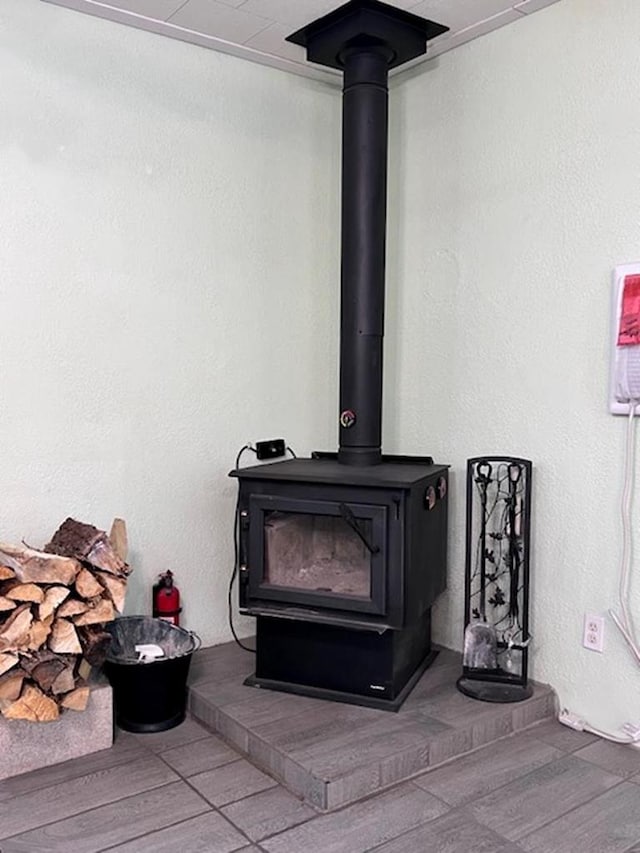 interior details featuring a wood stove