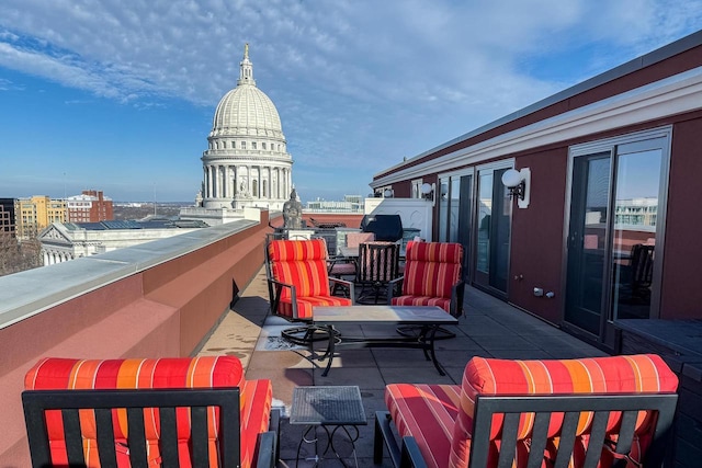 view of patio / terrace with a balcony