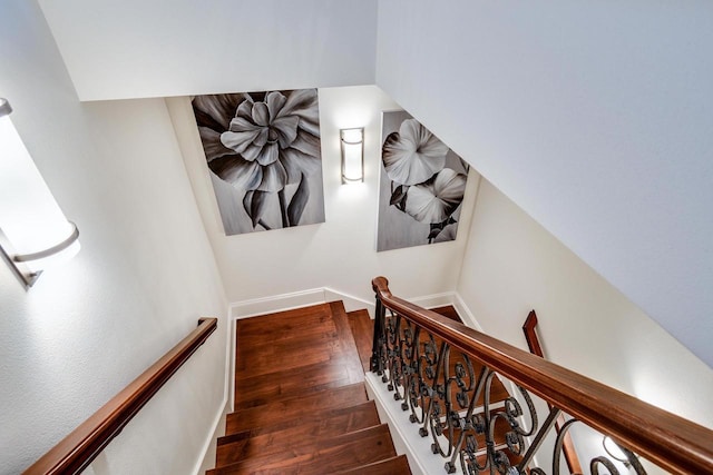 stairway featuring hardwood / wood-style floors