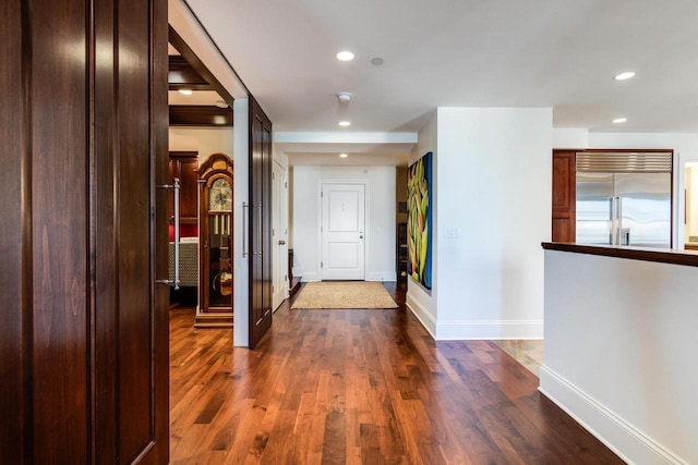 hall featuring dark wood-type flooring