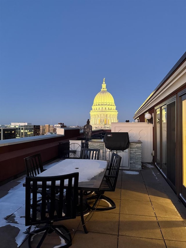 view of patio with a balcony