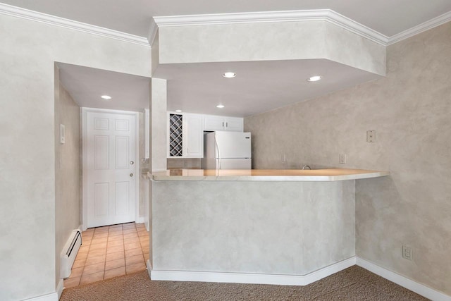 kitchen featuring white cabinetry, a baseboard radiator, white refrigerator, light tile patterned floors, and kitchen peninsula