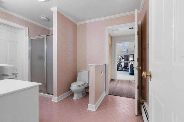 bathroom with toilet, an enclosed shower, ornamental molding, tile patterned flooring, and a baseboard heating unit