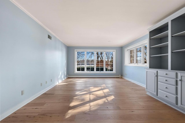 interior space featuring a baseboard radiator, ornamental molding, and light hardwood / wood-style floors