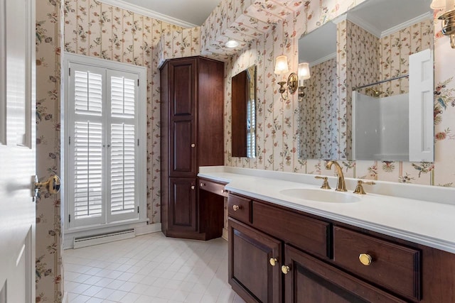 bathroom with vanity, crown molding, a healthy amount of sunlight, and walk in shower