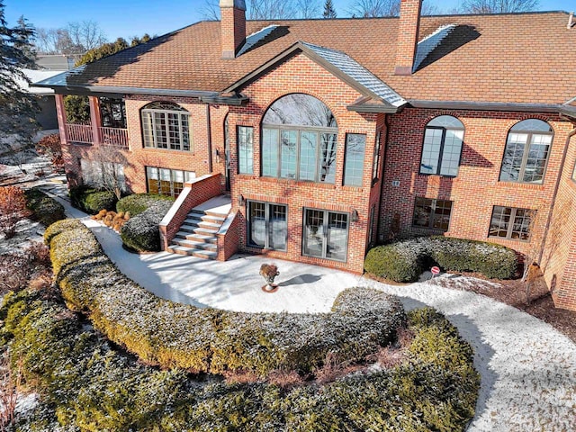 rear view of property with a patio area