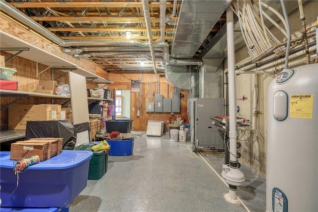 basement featuring heating unit, electric panel, and water heater