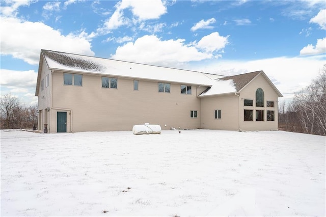 view of snow covered house